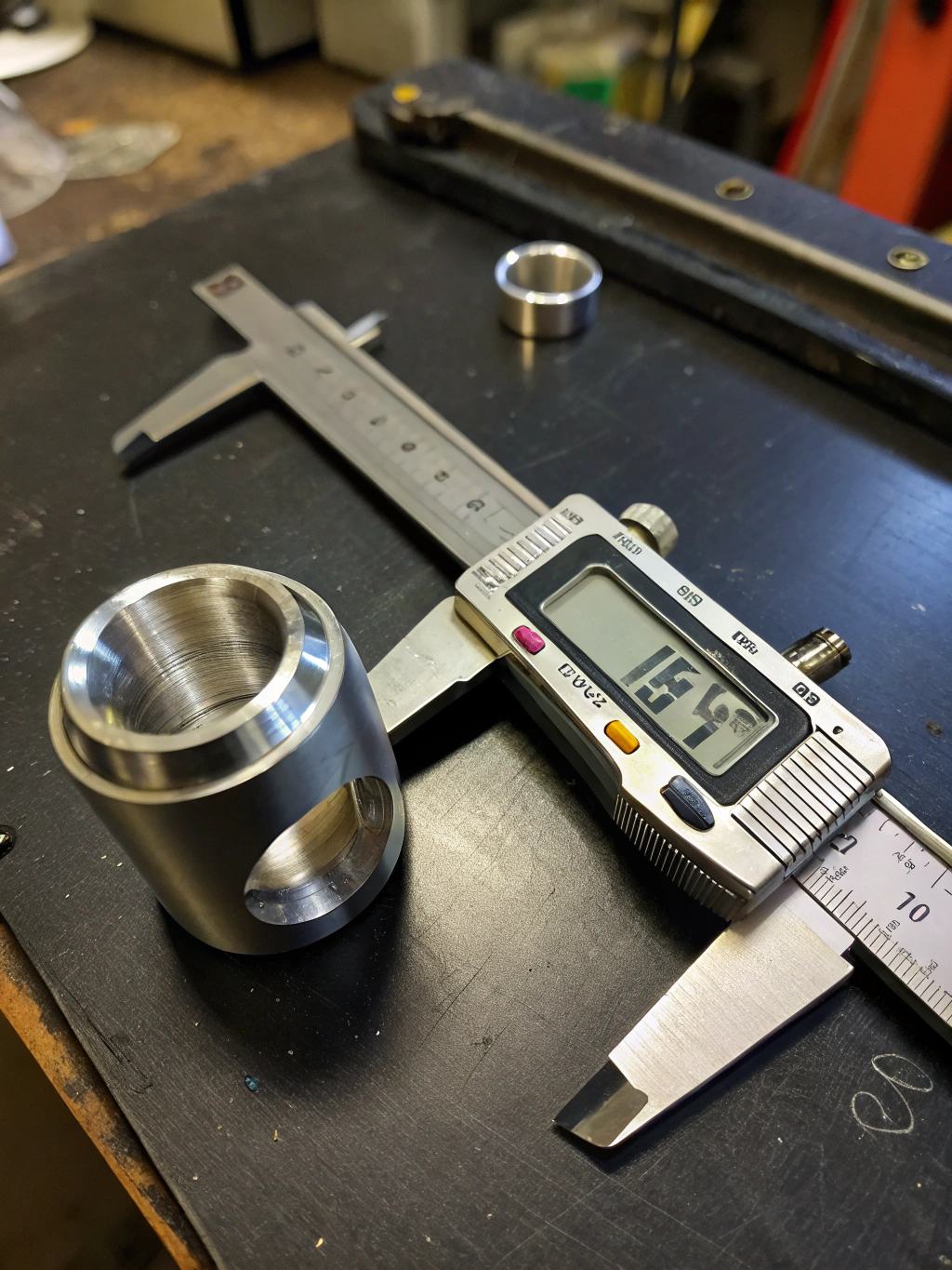 Precision caliper measuring a 3D printed mechanical part